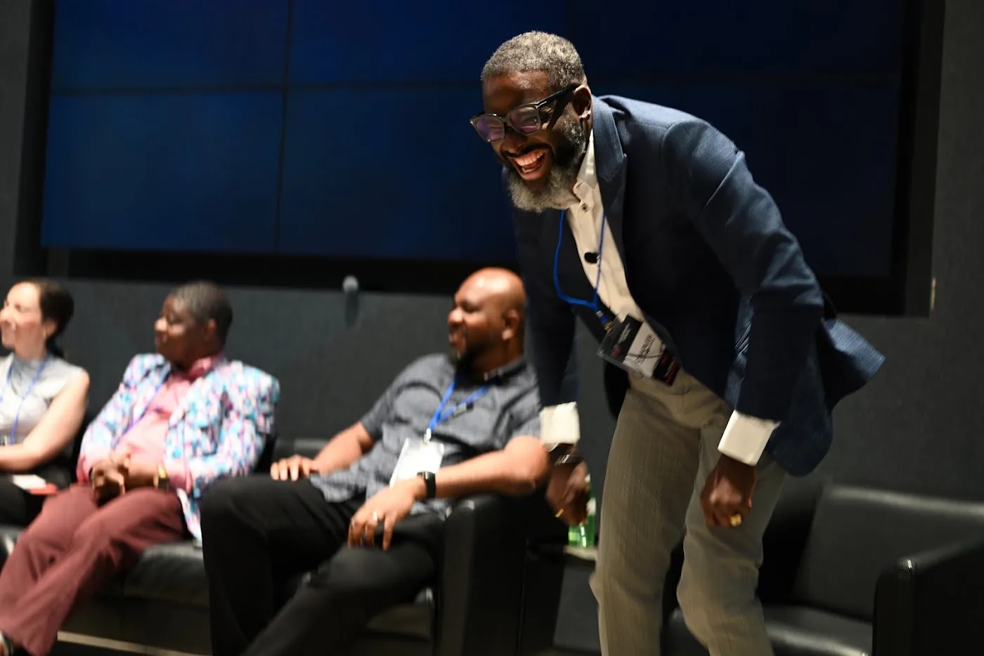 Dr. Charles Igwe engaging the room during the July event
